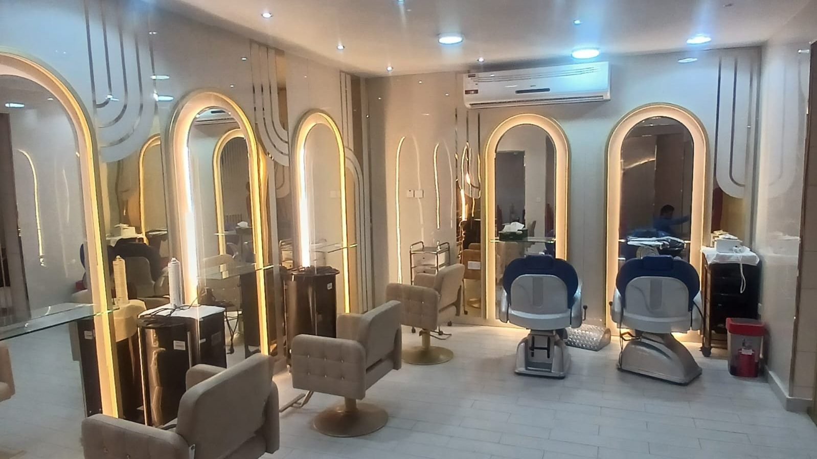 Completed arched mirror styling stations at the Al Massa beauty center, Al Matar El Kadim